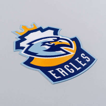 FlexStyle Textured Non-Metallic eagles emblem laid at a hard angle